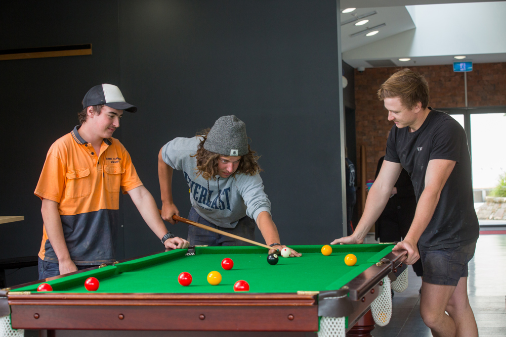 Student's relaxing and socialising over a game of pool