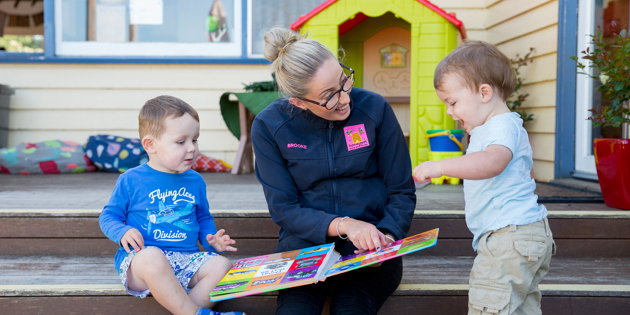 Brooke O'Brien with child at daycare