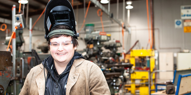 Female welding student