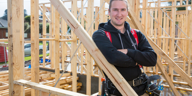 Dom Currer working as a builder