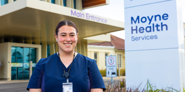 SWTAFE graduate Laura in front of Moyne Health Clinic